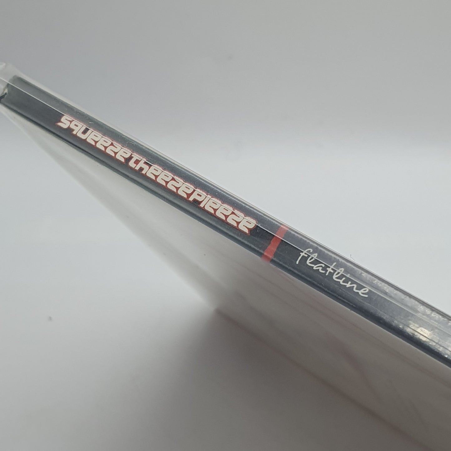 Squeeze Theeze Pleeze – Flatline