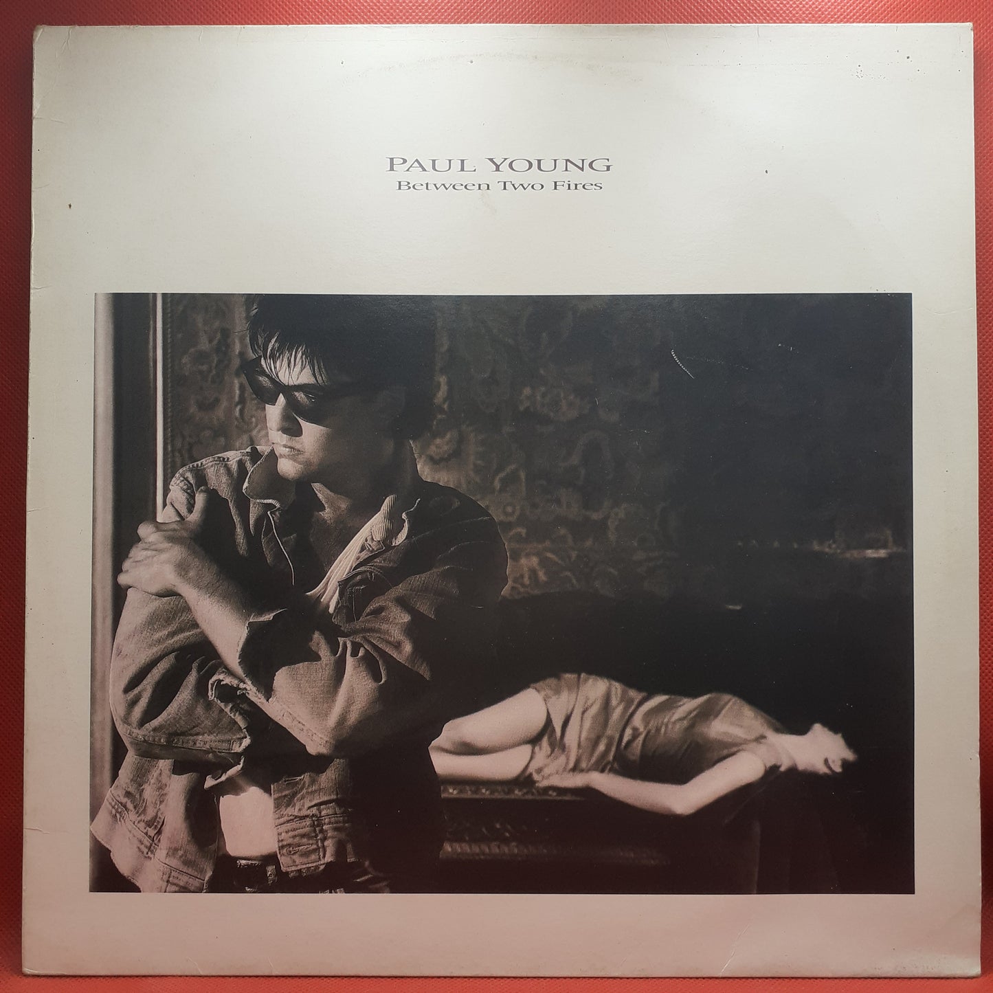 Paul Young – Between Two Fires