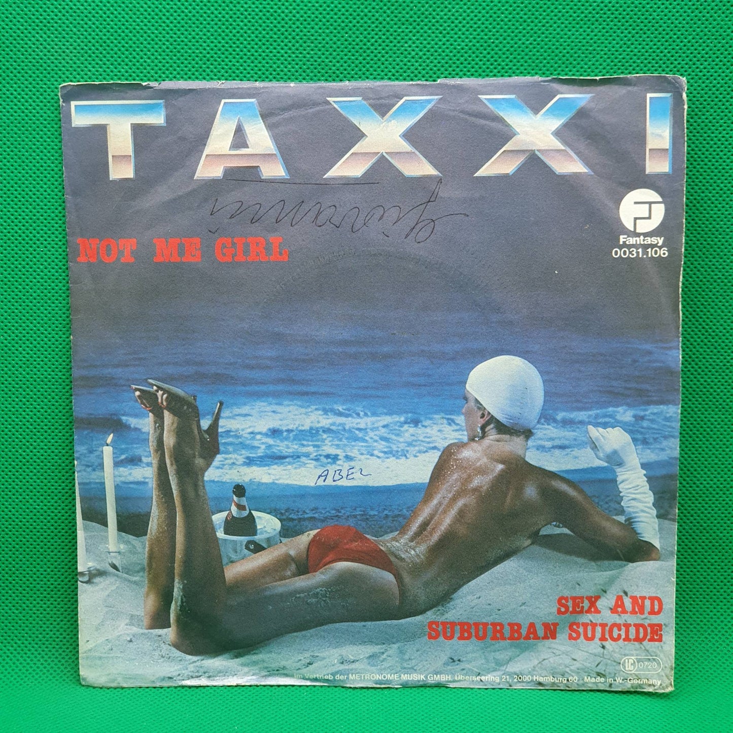 Taxxi ‎– Not Me Girl