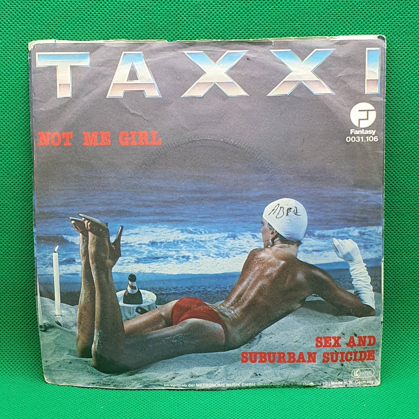 Taxxi ‎– Not Me Girl