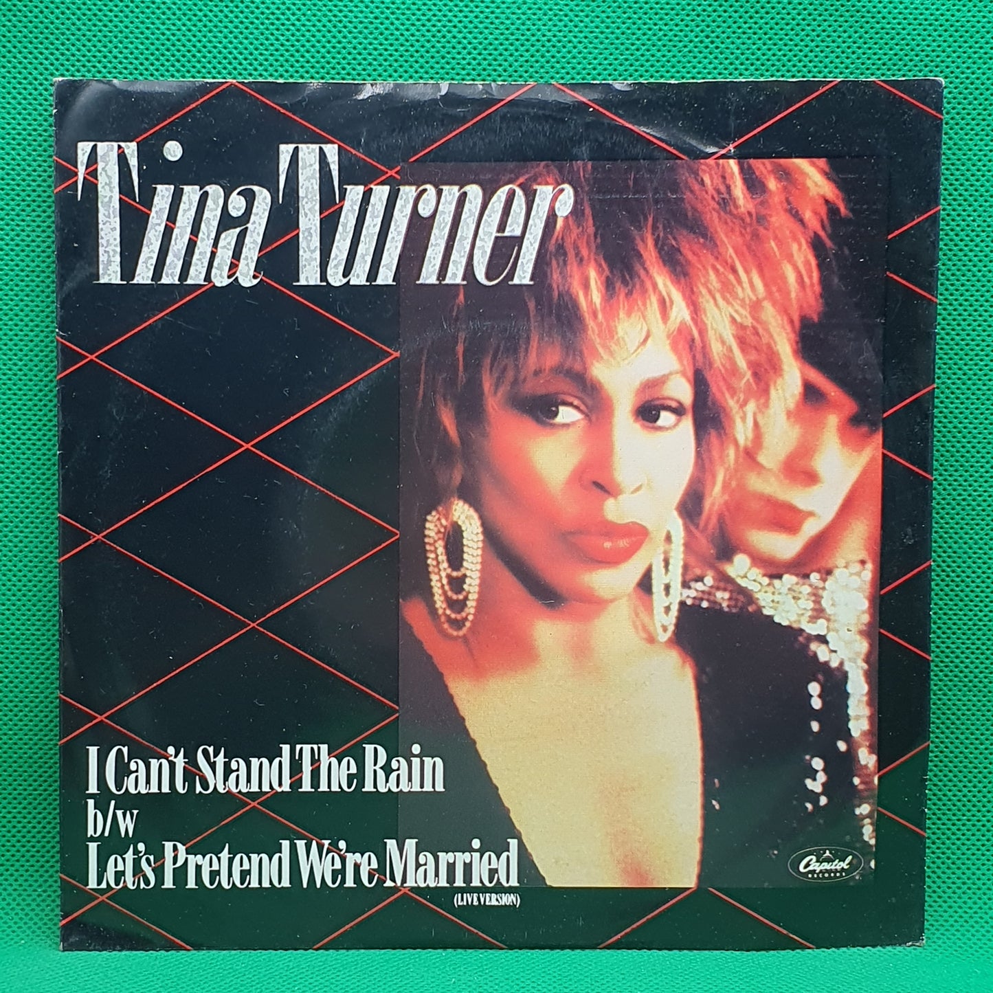 Tina Turner ‎– I Can't Stand The Rain / Let's Pretend We're Married (Live Version)