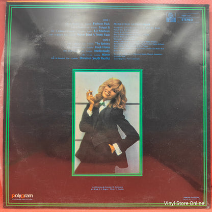 Amanda Lear ‎– Never Trust A Pretty Face