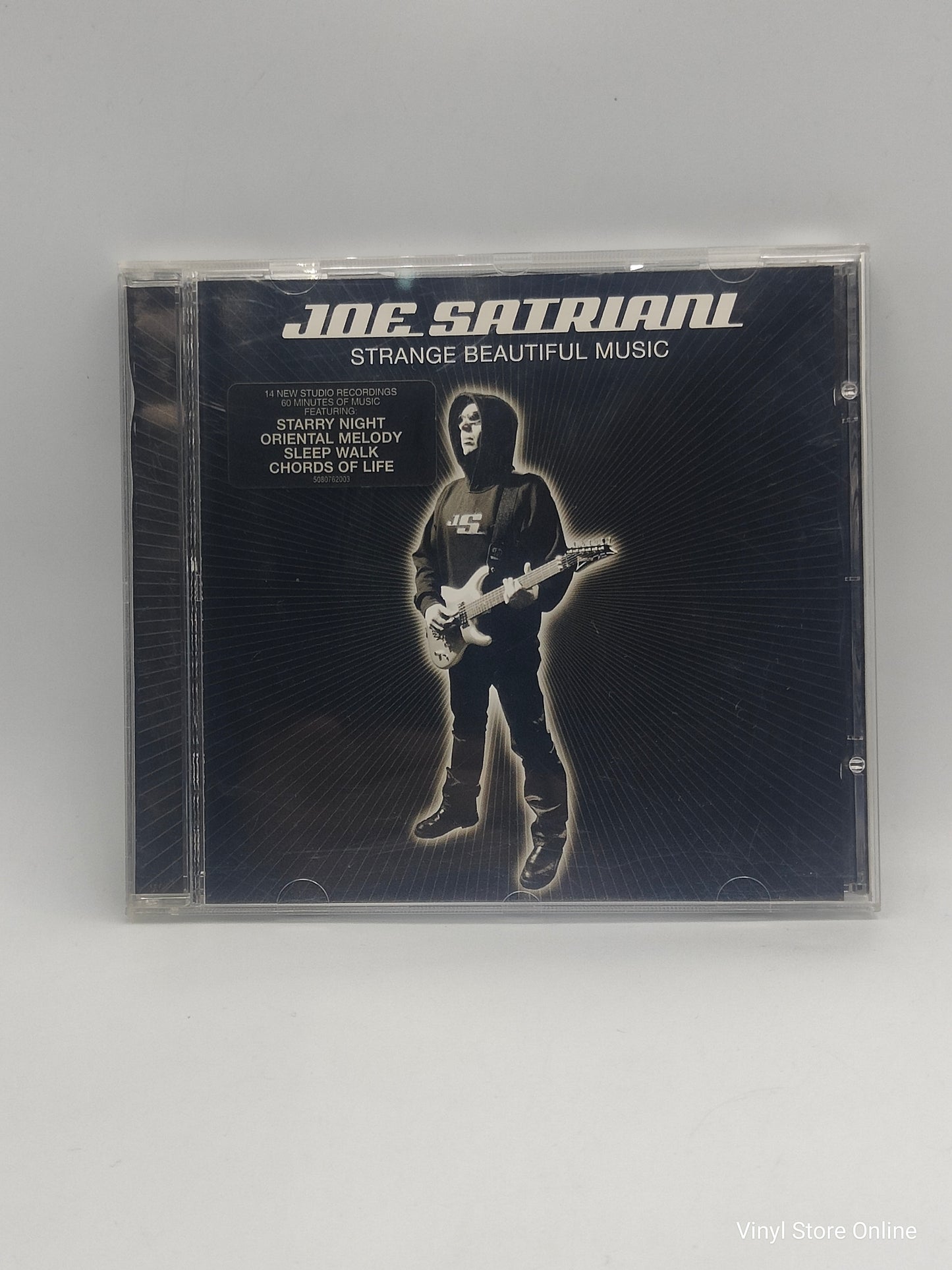 Joe Satriani ‎– Strange Beautiful Music