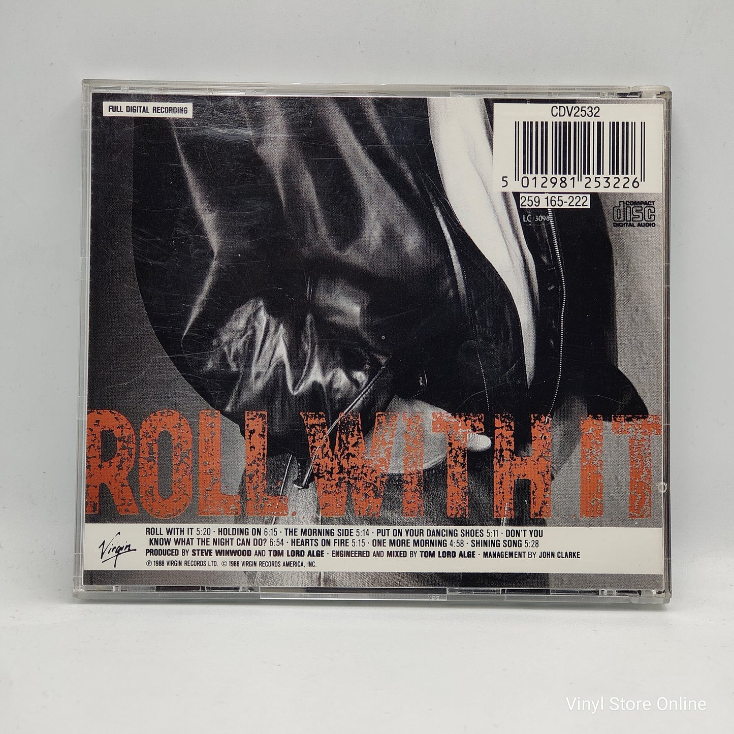 Steve Winwood ‎– Roll With It