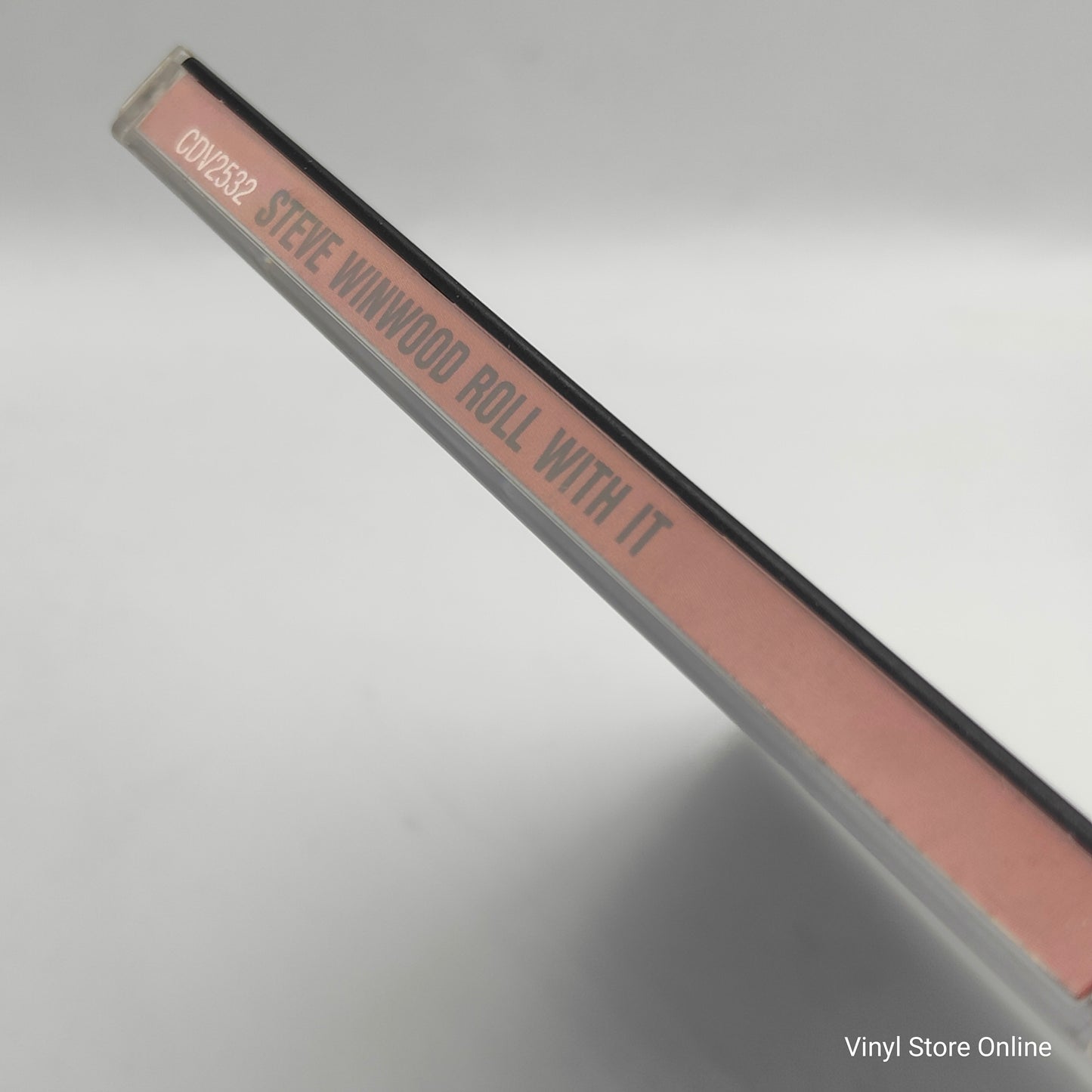 Steve Winwood ‎– Roll With It