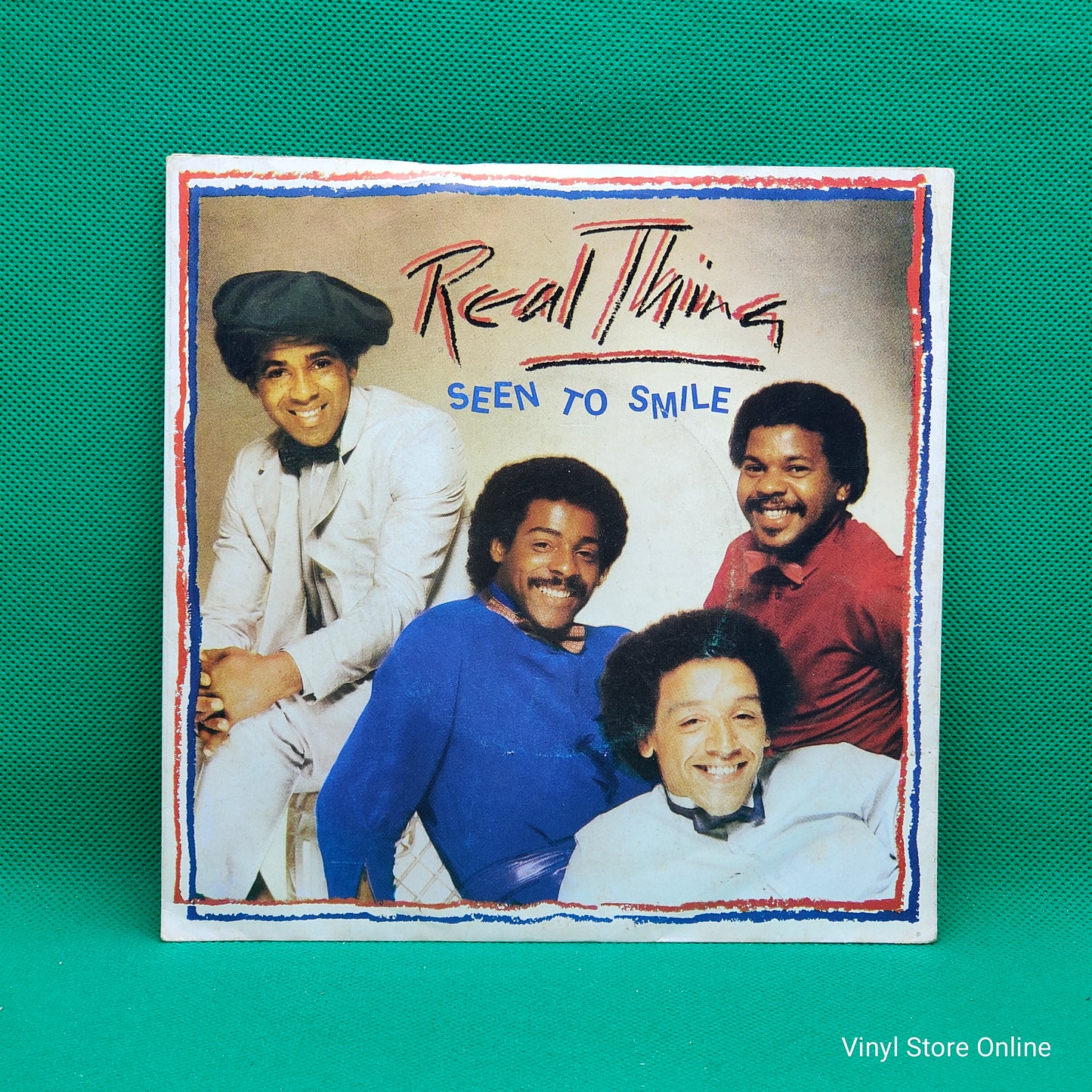 The Real Thing ‎– Seen To Smile