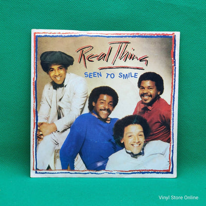 The Real Thing ‎– Seen To Smile - Vinyl Store Online