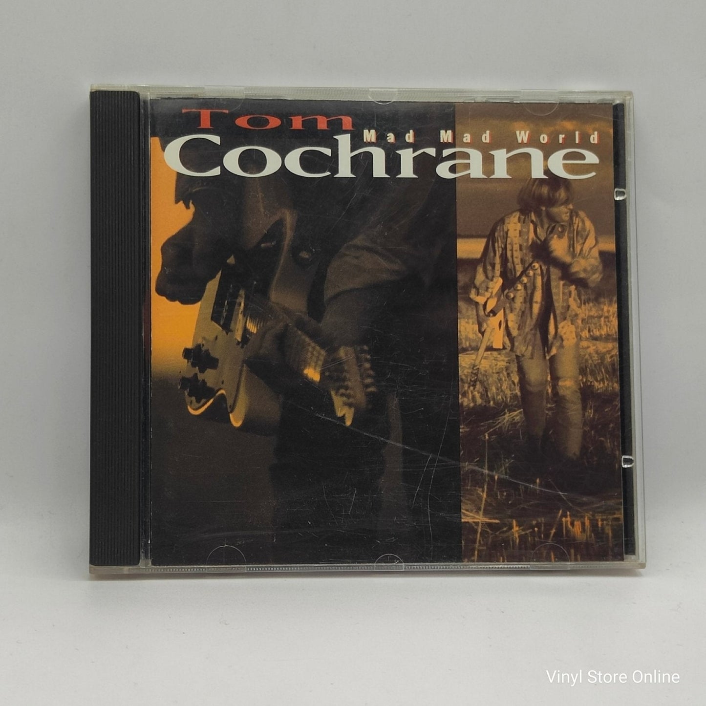 Tom Cochrane ‎– Mad Mad World - Vinyl Store Online