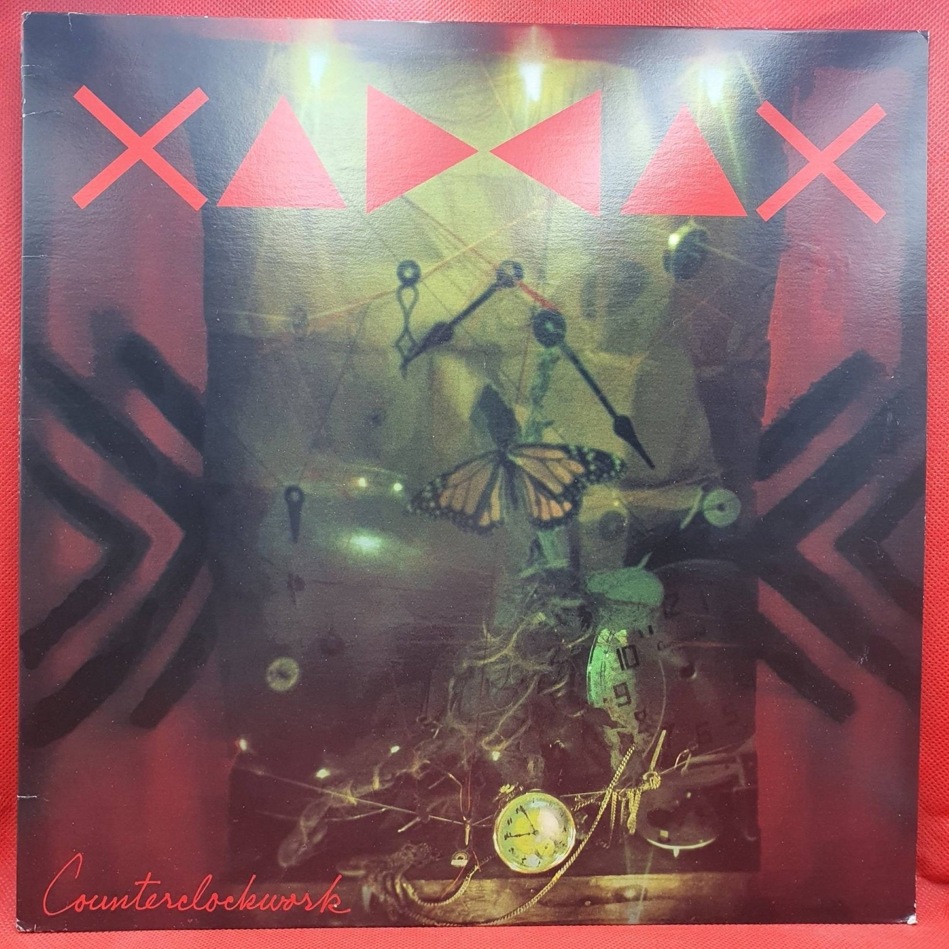 Xaddax ‎– Counterclockwork - Vinyl Store Online